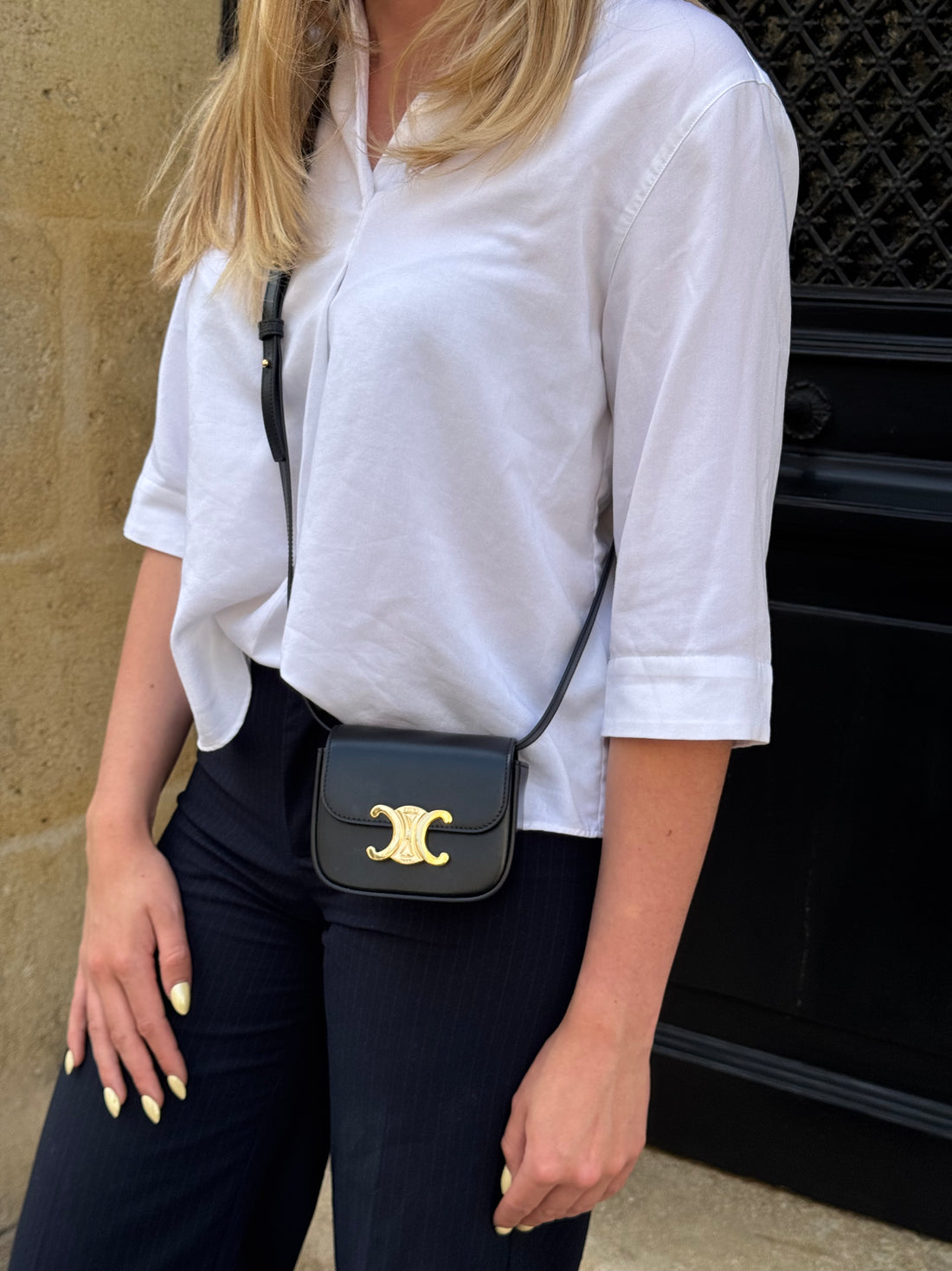 Céline – Mini-Claude-Tasche aus schwarzem Leder
