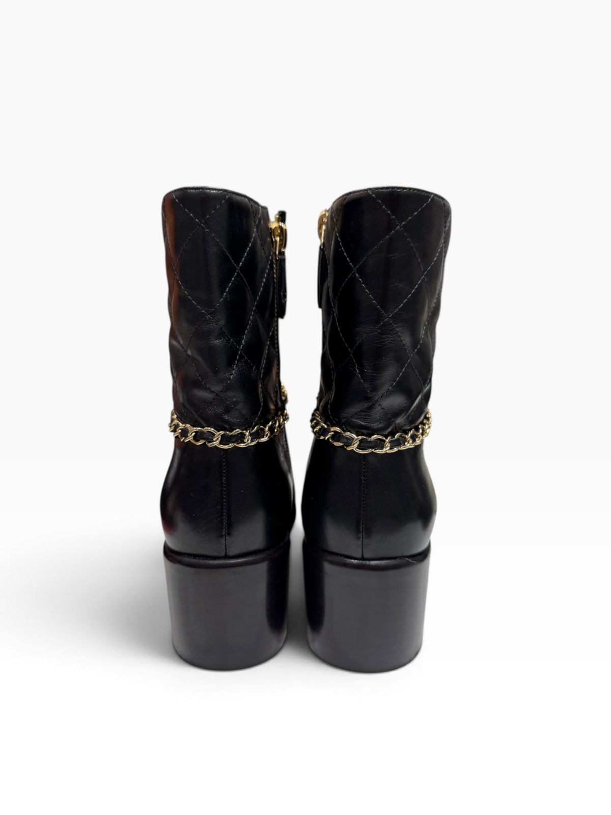 Chanel - Bottines en cuir noir avec chaîne dorée