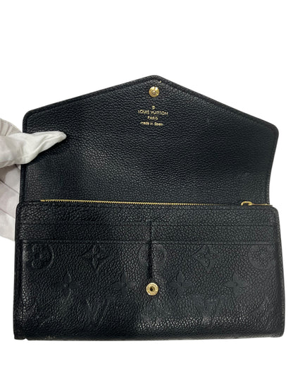 Louis Vuitton - portefeuille Sarah cuir empreinte noir