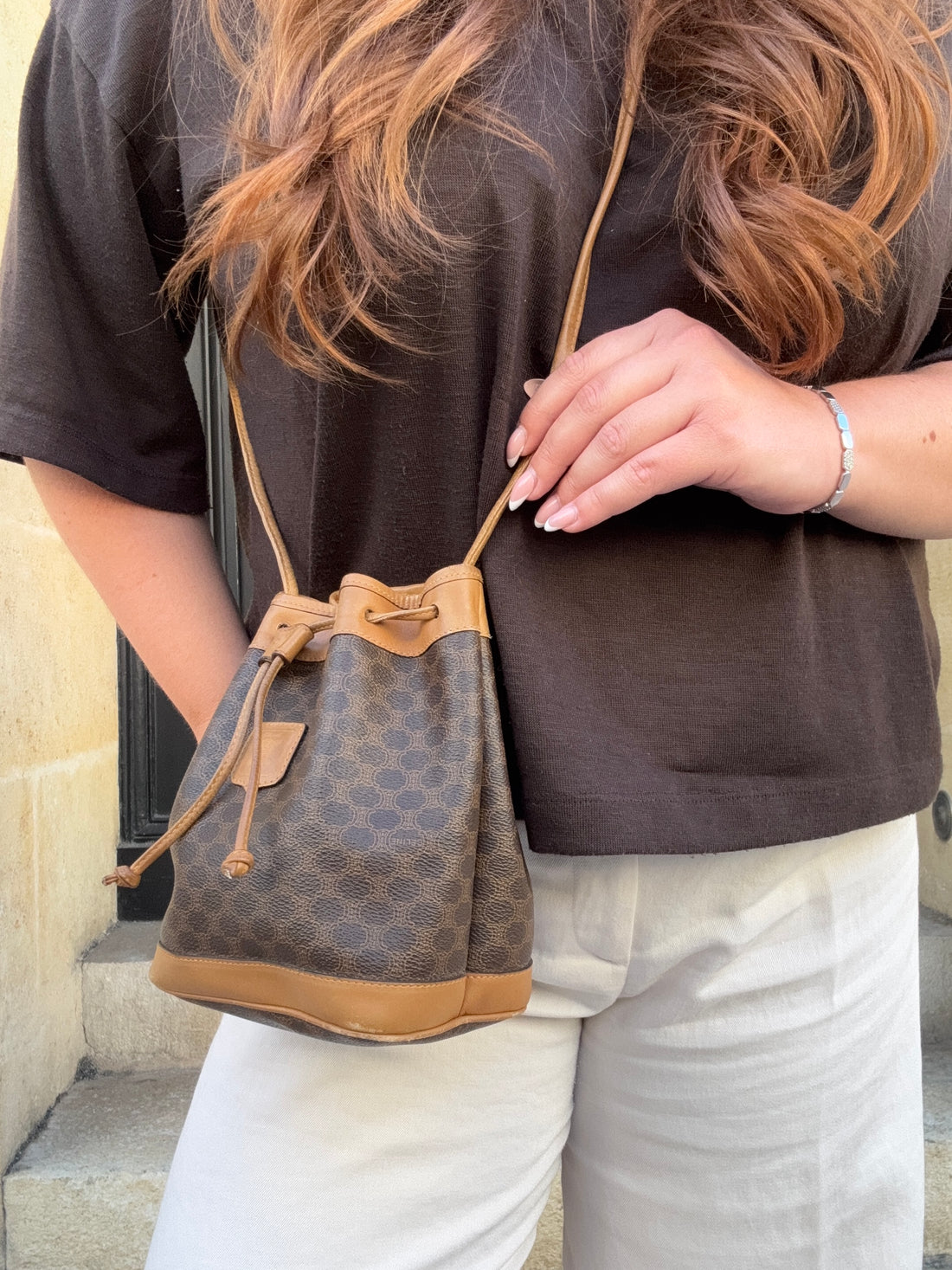 Céline – Mini-Beuteltasche aus Macadam-Canvas und Leder