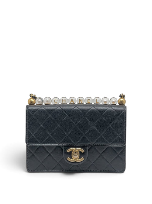 Chanel - Sac Matelassé avec perles sur la chaîne
