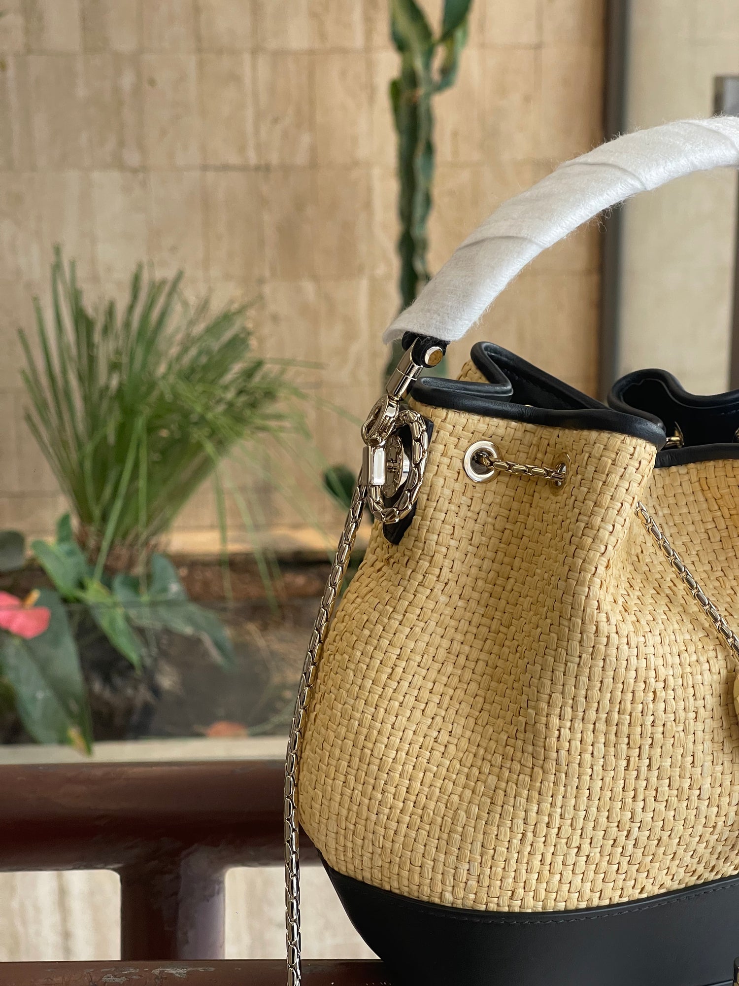 Bvlgari - serpenti leather and raffia bucket bag