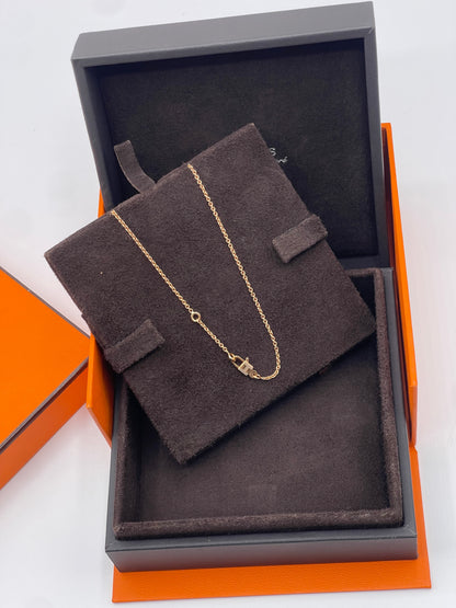 Hermès - Kelly padlock pendant in pink gold and diamonds