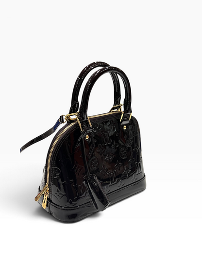 Louis Vuitton - sac bb Alma cuir vernis amarante