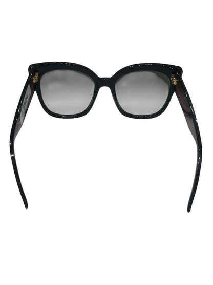 Gucci - solaires oversize noires bandes et charms