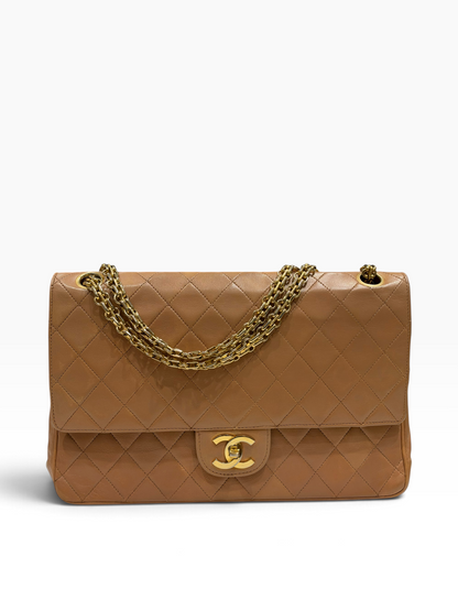 Chanel - Sac Timeless Medium cuir matelassé beige