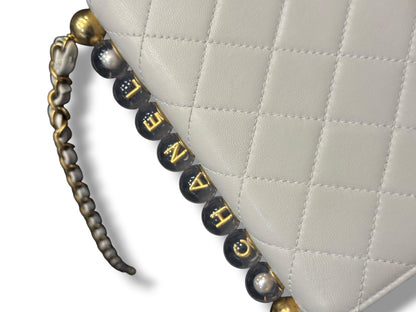 Chanel - Sac Petit Chic perles Écru