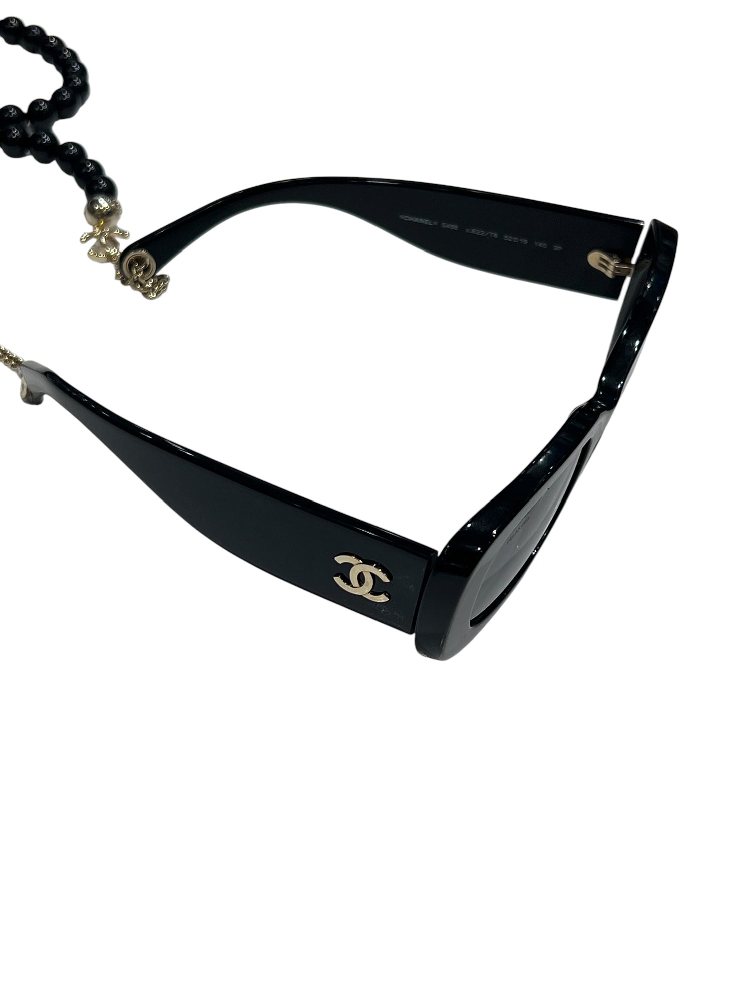 Chanel - solaires avec chaîne perlées noires