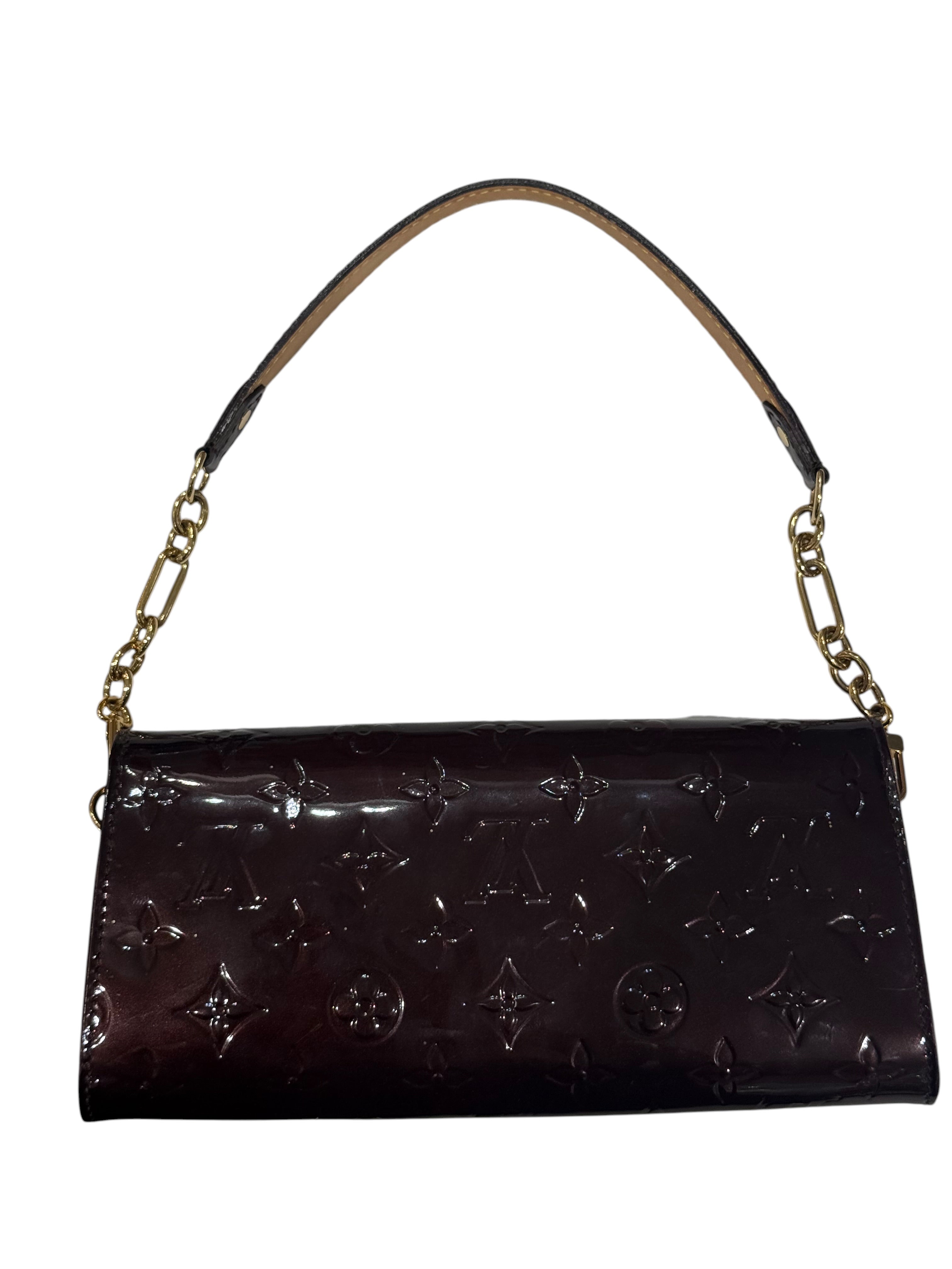 Louis Vuitton - Sac pochette Eva