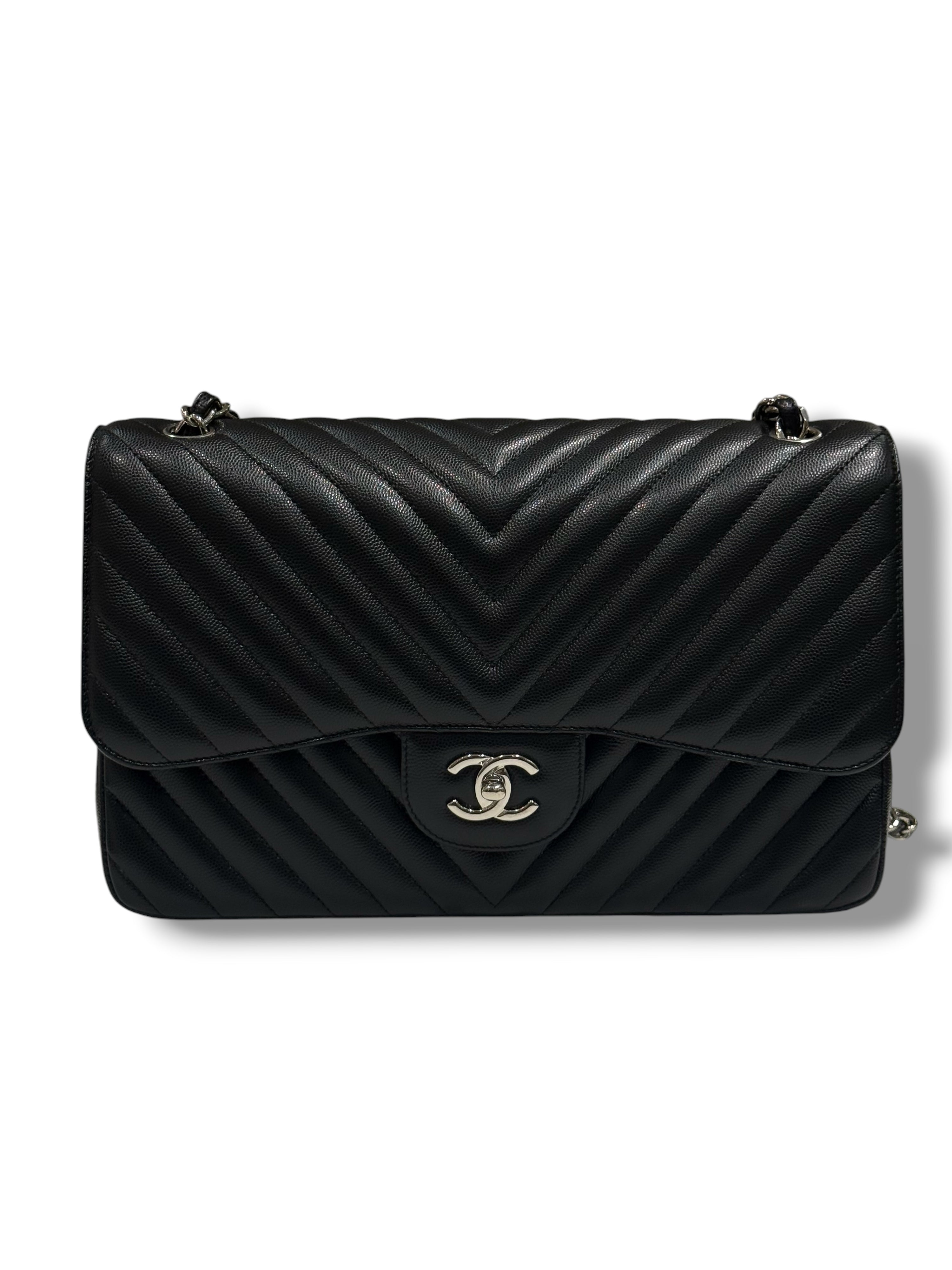 Chanel - Sac Jumbo noir cuir caviar chevron