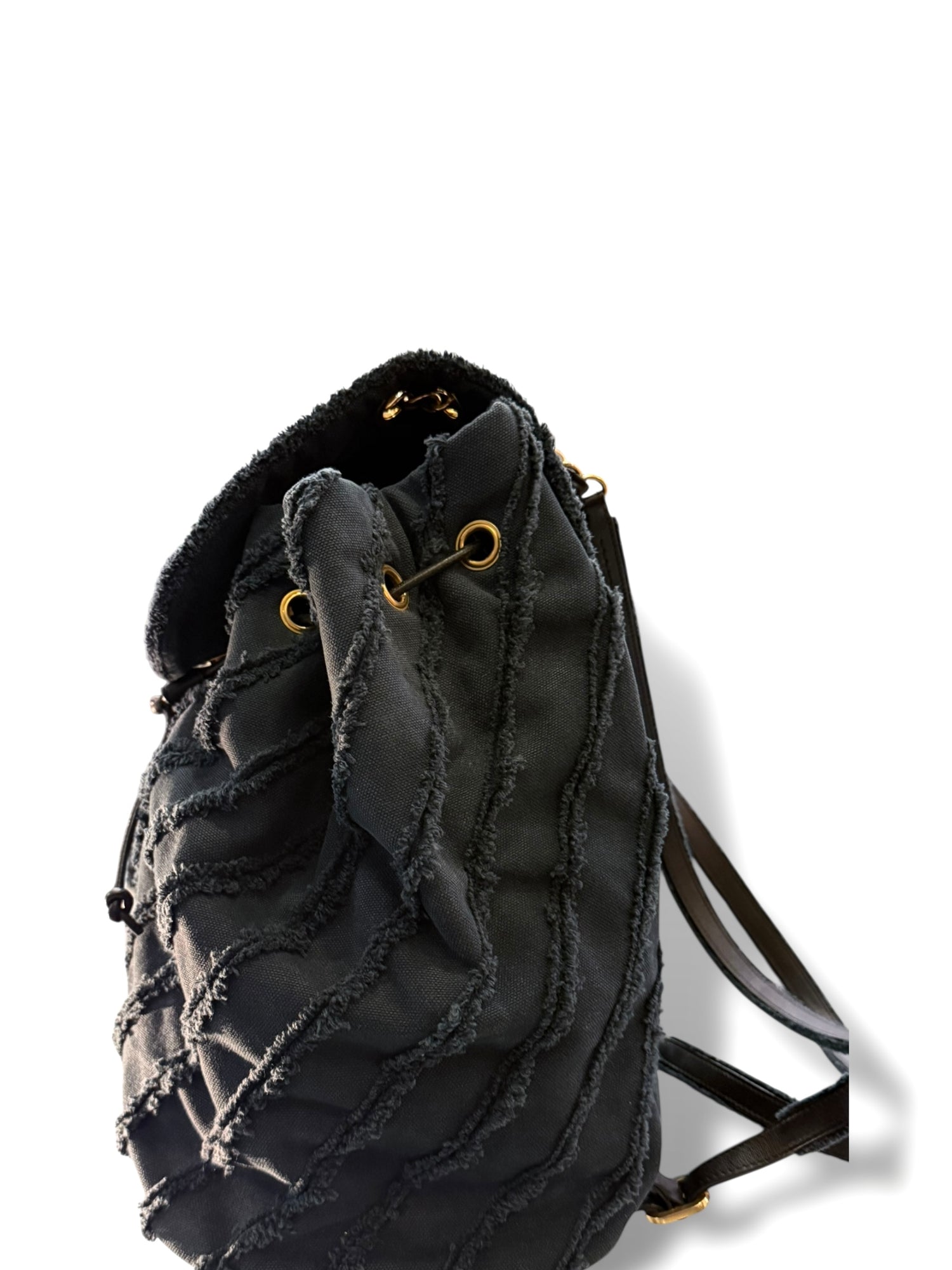 Chanel - Sac à dos moyen modèle en tissus effrangé