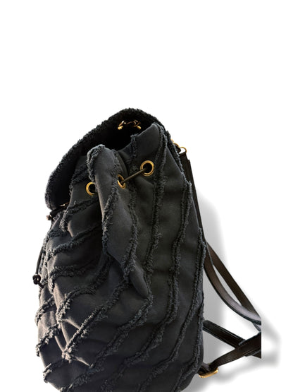 Chanel - Sac à dos moyen modèle en tissus effrangé