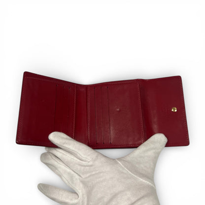 Louis Vuitton - Porte monnaie en cuir vernis rouge
