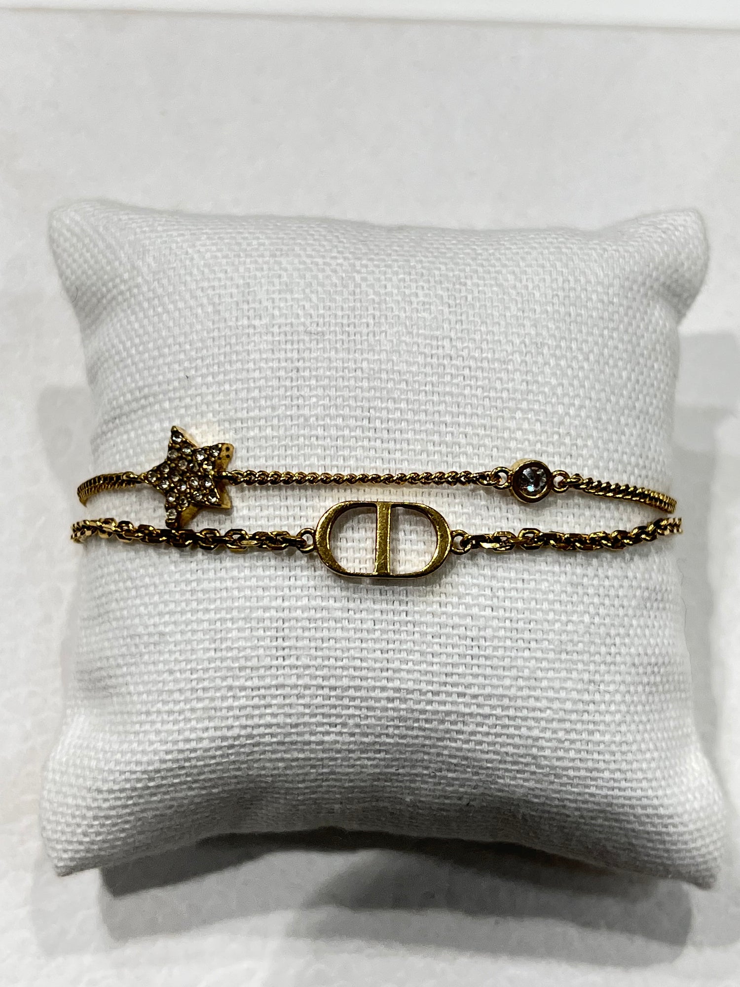 Dior - bracelet chaîne dorée ce et étoile strass