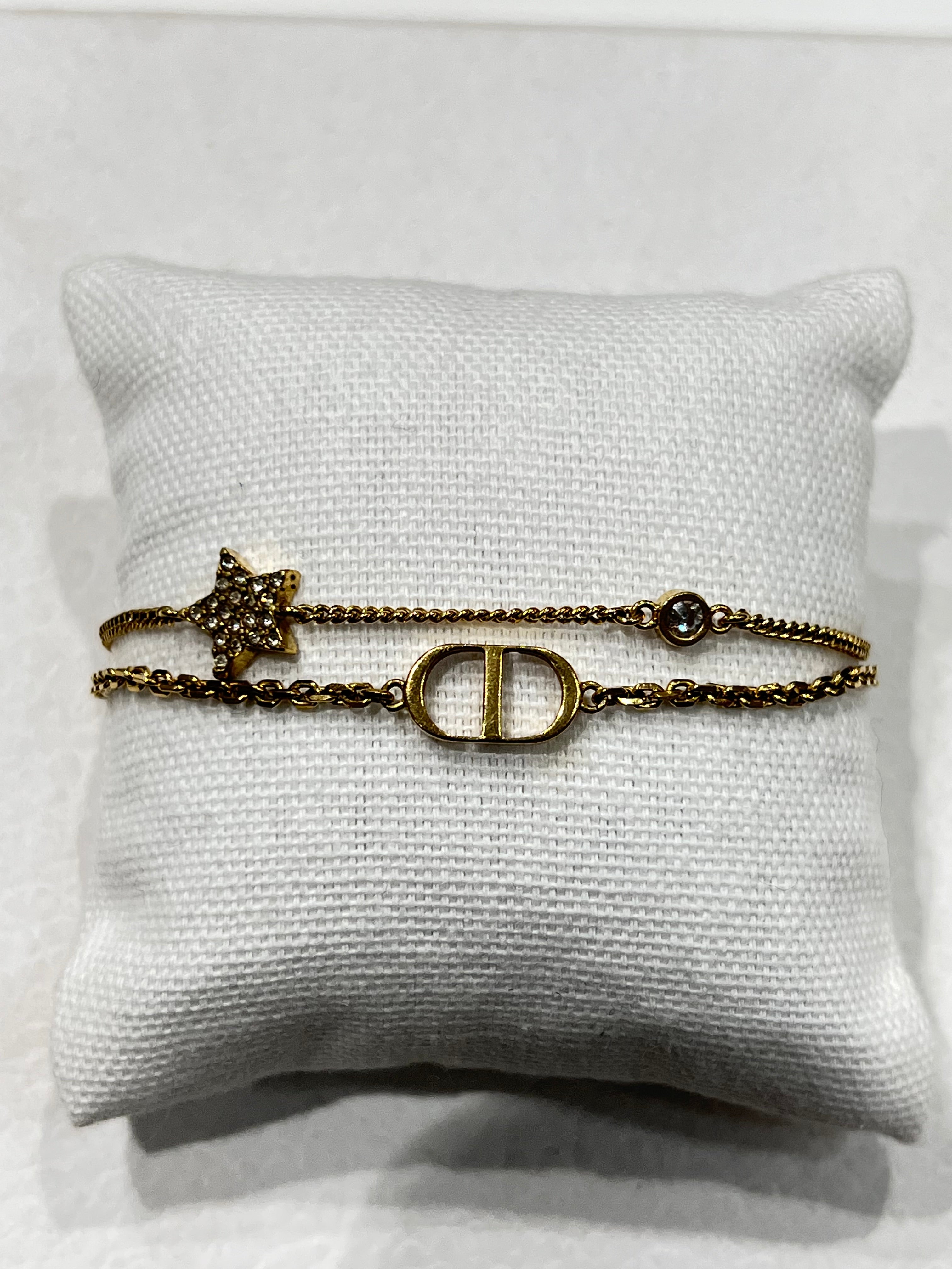 Dior - bracelet chaîne dorée ce et étoile strass