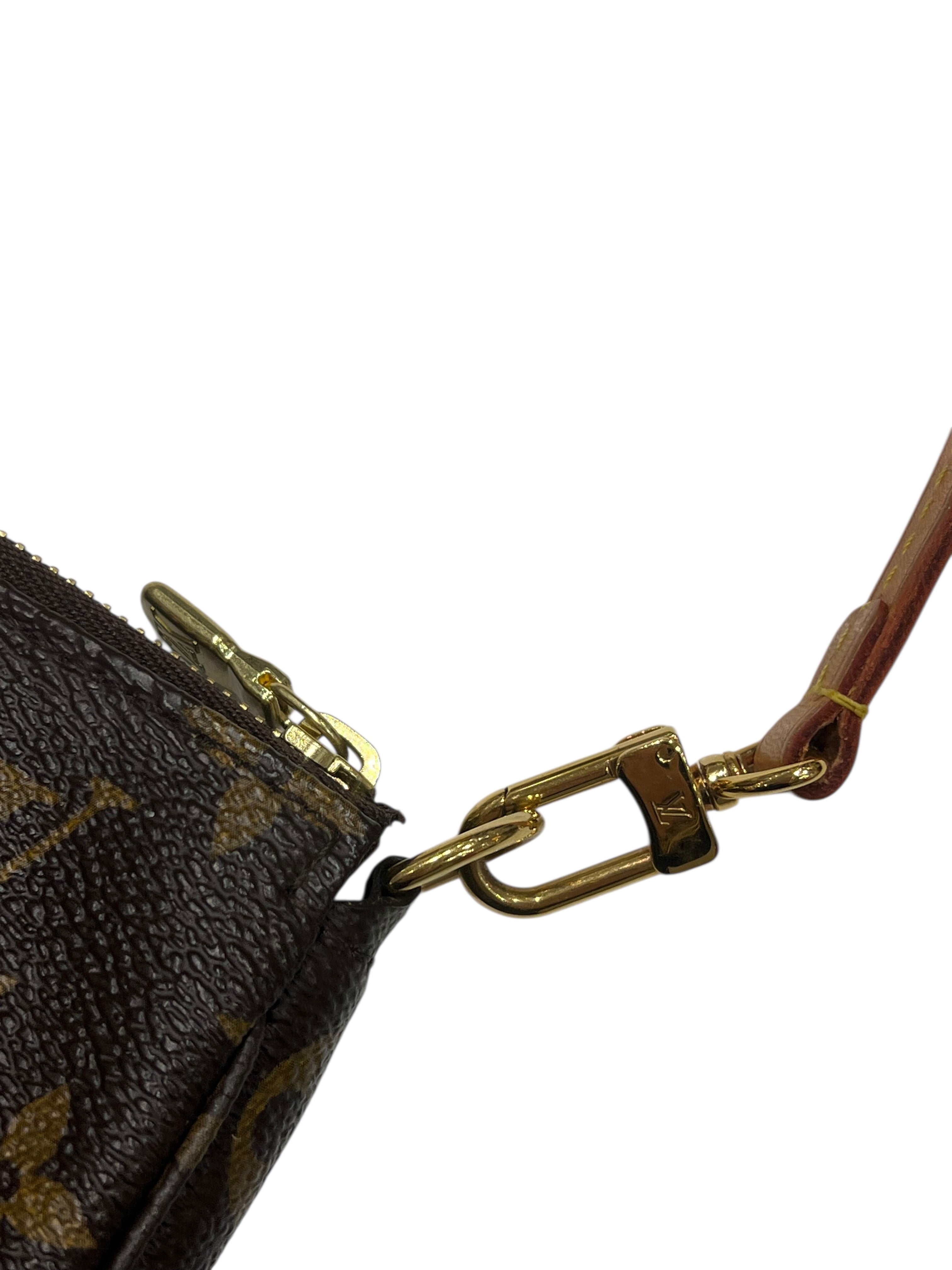 Louis Vuitton - Sac pochette toile monogramme