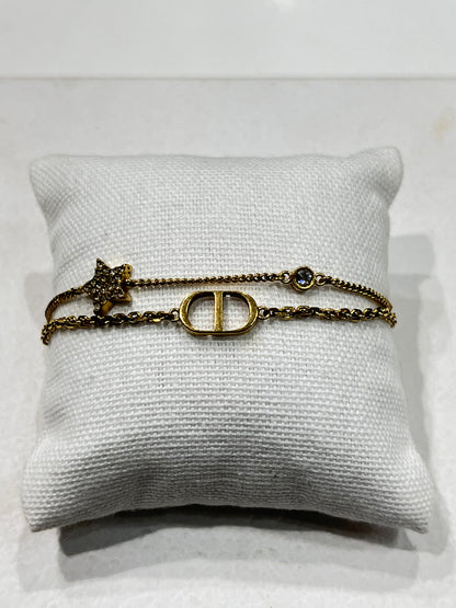 Dior - bracelet chaîne dorée ce et étoile strass