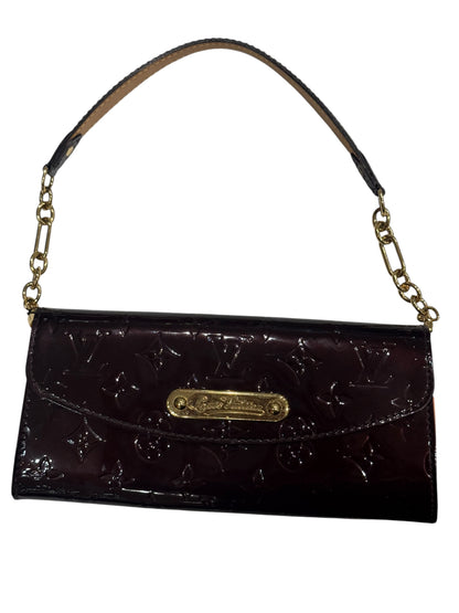 Louis Vuitton - Sac pochette Eva