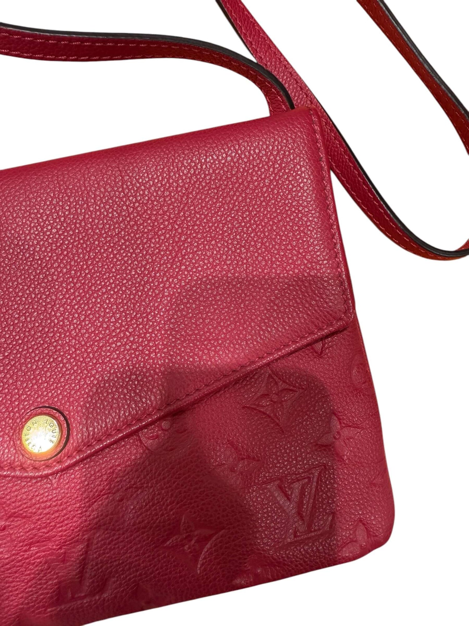 Louis Vuitton - Sac pochette en cuir monogramme rouge