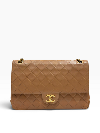 Chanel - Sac Timeless Medium cuir matelassé beige
