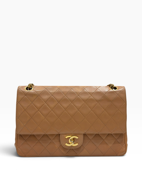 Chanel - Sac Timeless Medium cuir matelassé beige