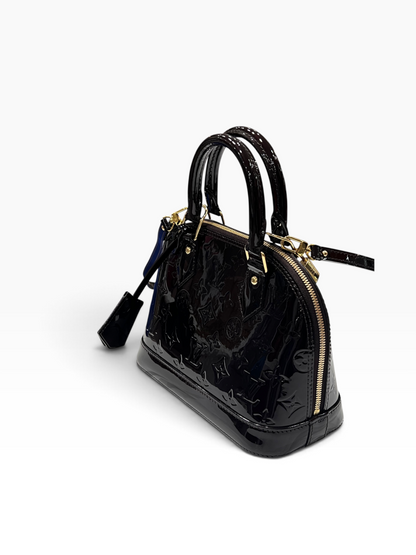 Louis Vuitton - sac bb Alma cuir vernis amarante