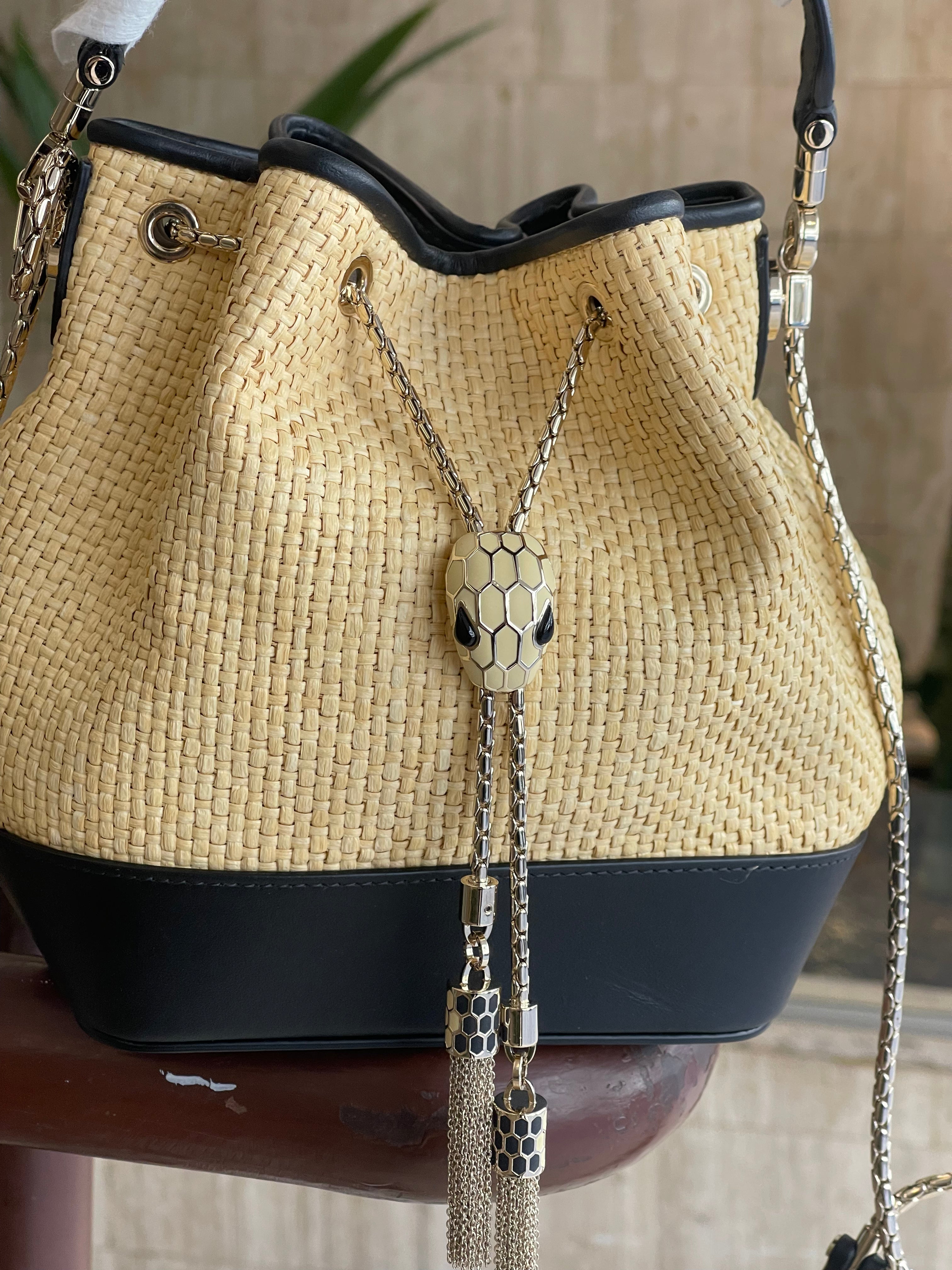 Bvlgari - serpenti leather and raffia bucket bag