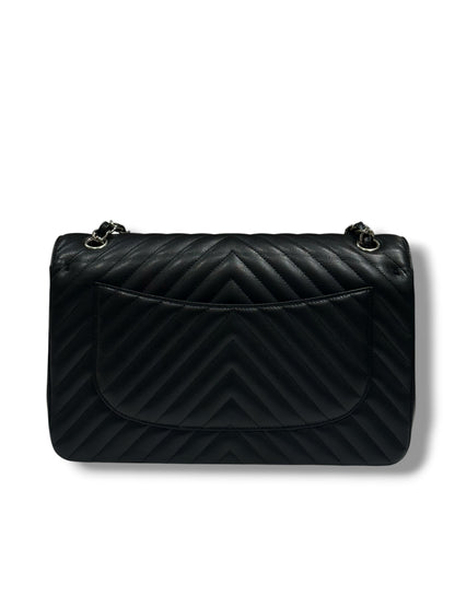 Chanel - Sac Jumbo noir cuir caviar chevron