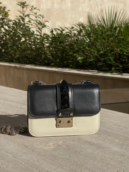 Valentino - mini glam lock bag in two-tone leather