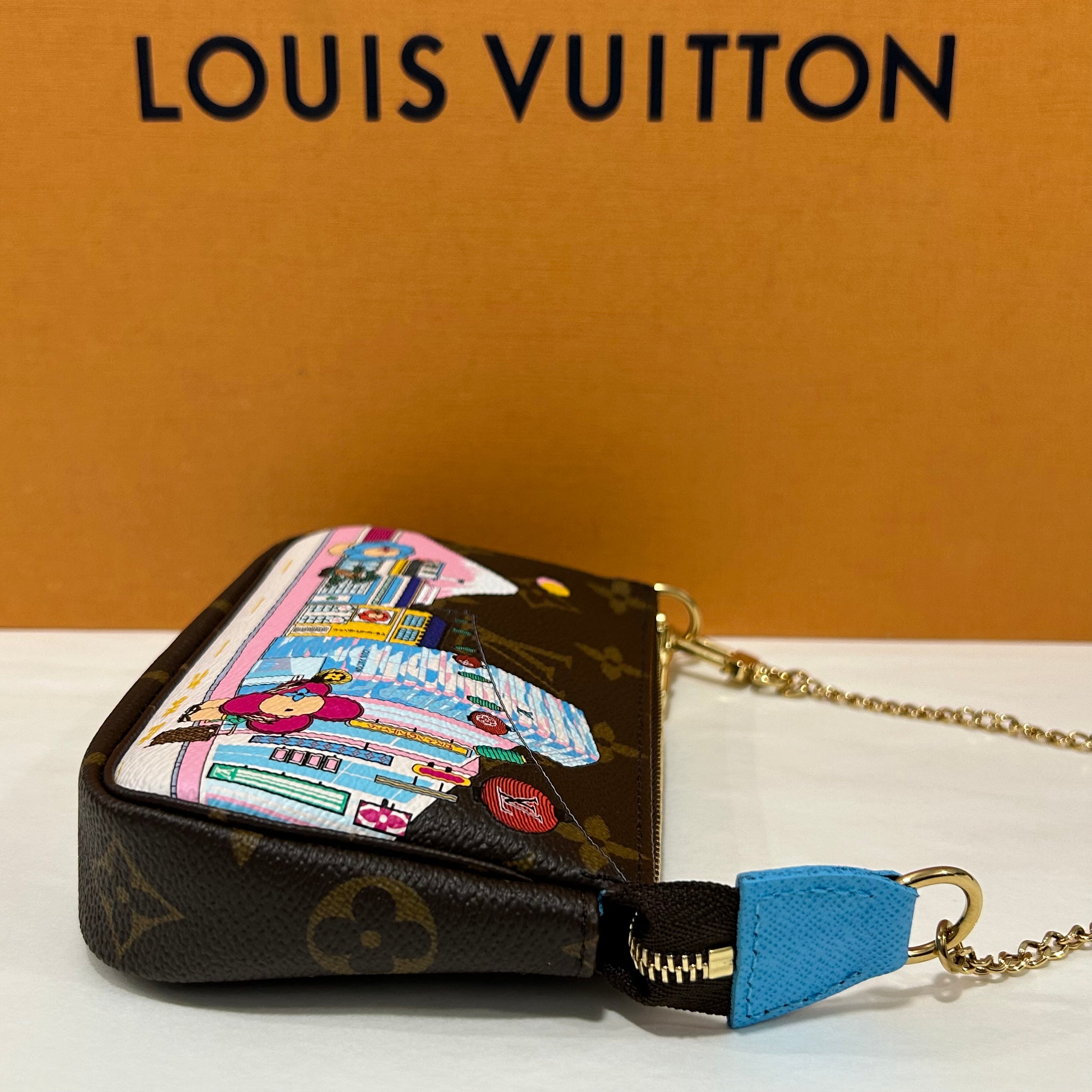 Louis Vuitton - Mini clutch