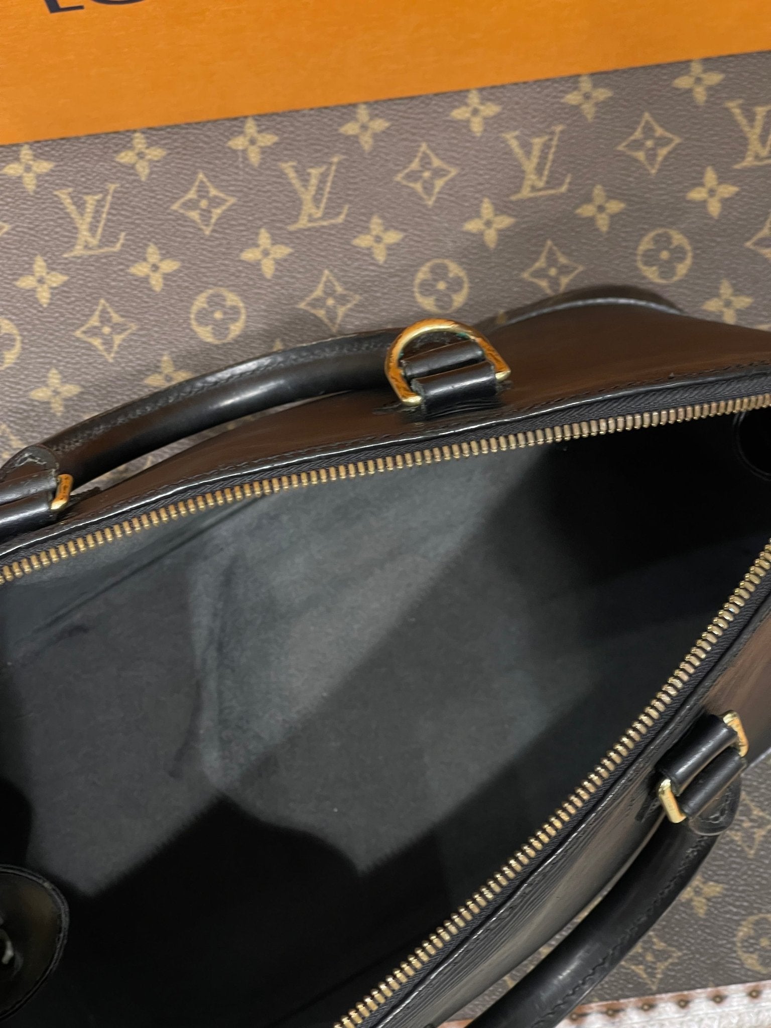 Louis Vuitton Epi black Alma MM bag